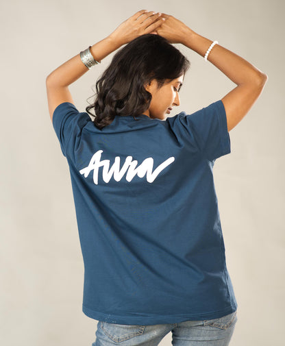 Person wearing a blue shirt with 'AWA' printed on the back against a neutral background
